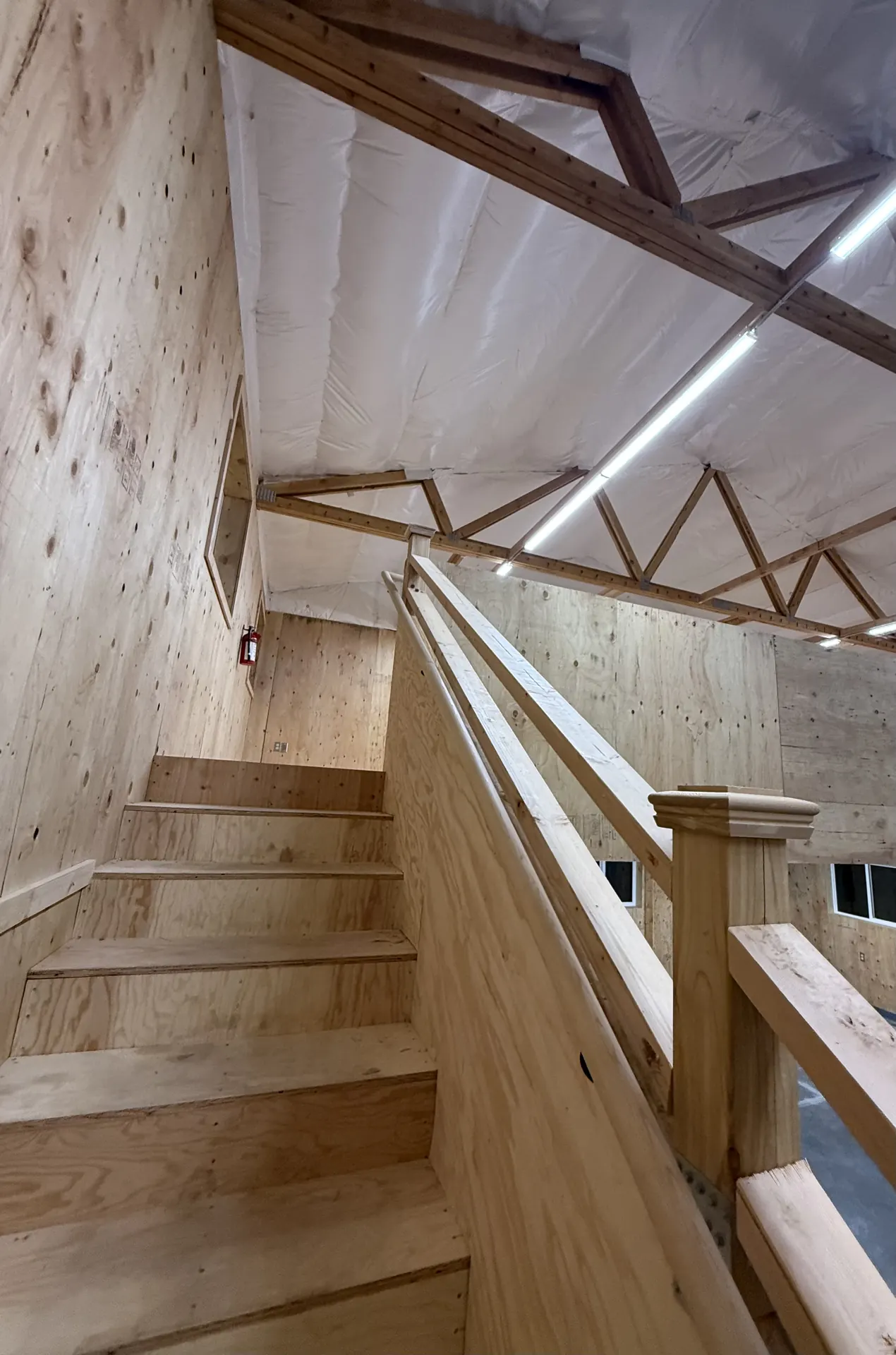 Wood stair and railing inside the building at Walla Walla Veterans Home