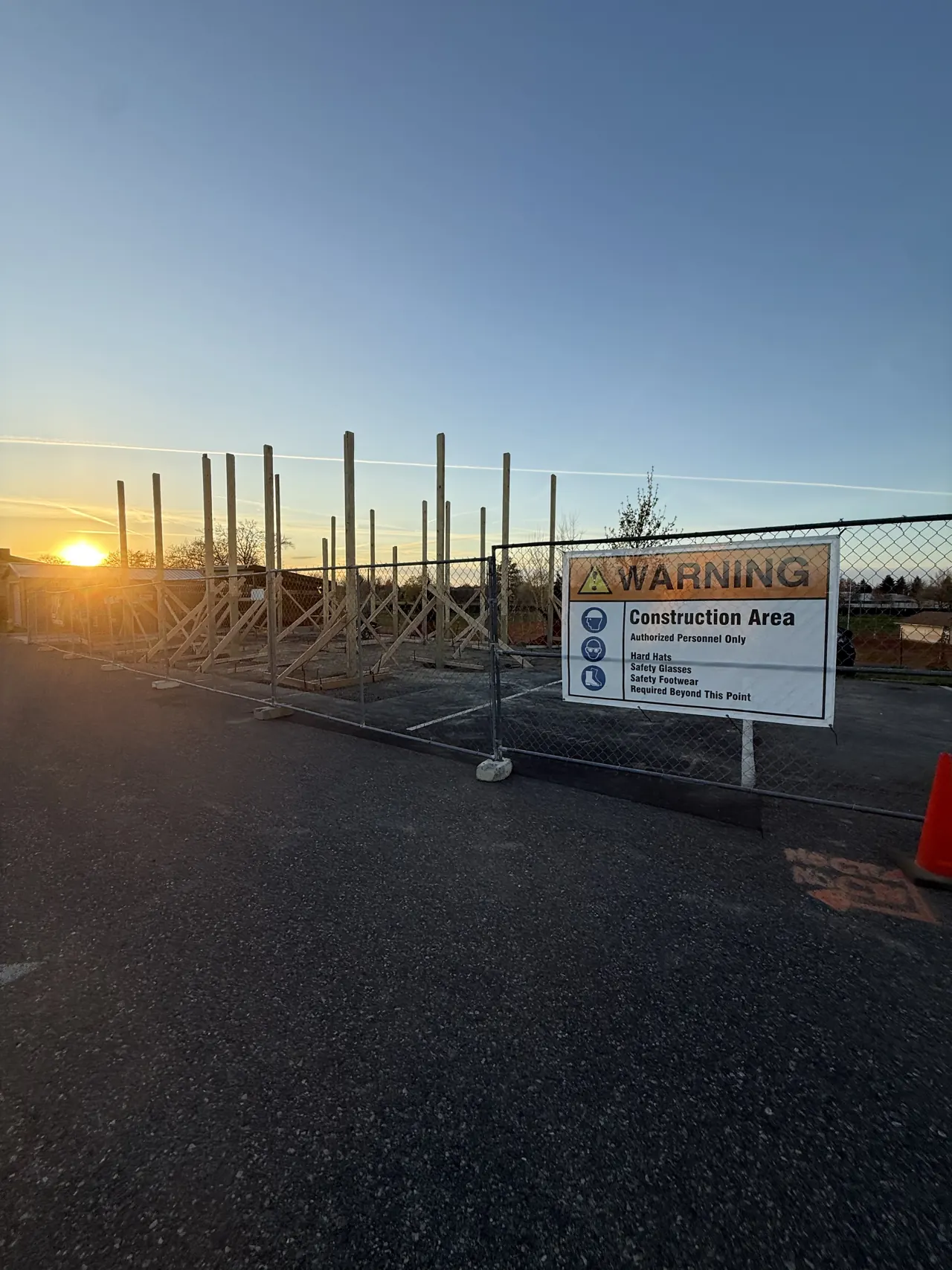 Building posts and site preparation at sunset at Walla Walla Veterans Home
